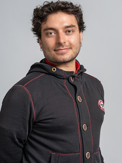 Portrait photograph of staff member, Leo Corredor-Garcia